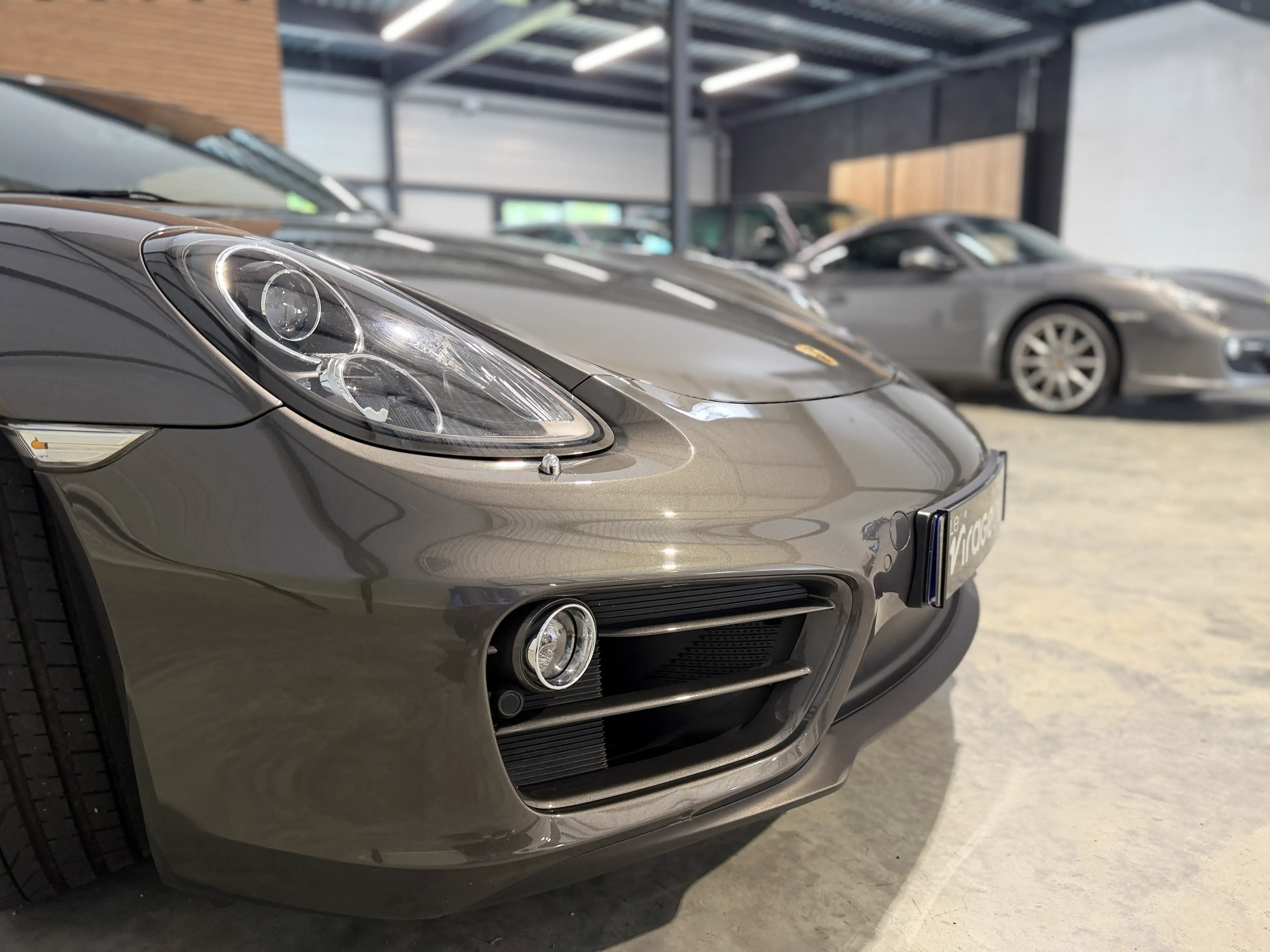 Image secondaire de Porsche Cayman 981 - 275 cv - PDK - 61000 Km - Siege chauffants - Echappement sport - Interieur Cuir - Xenon