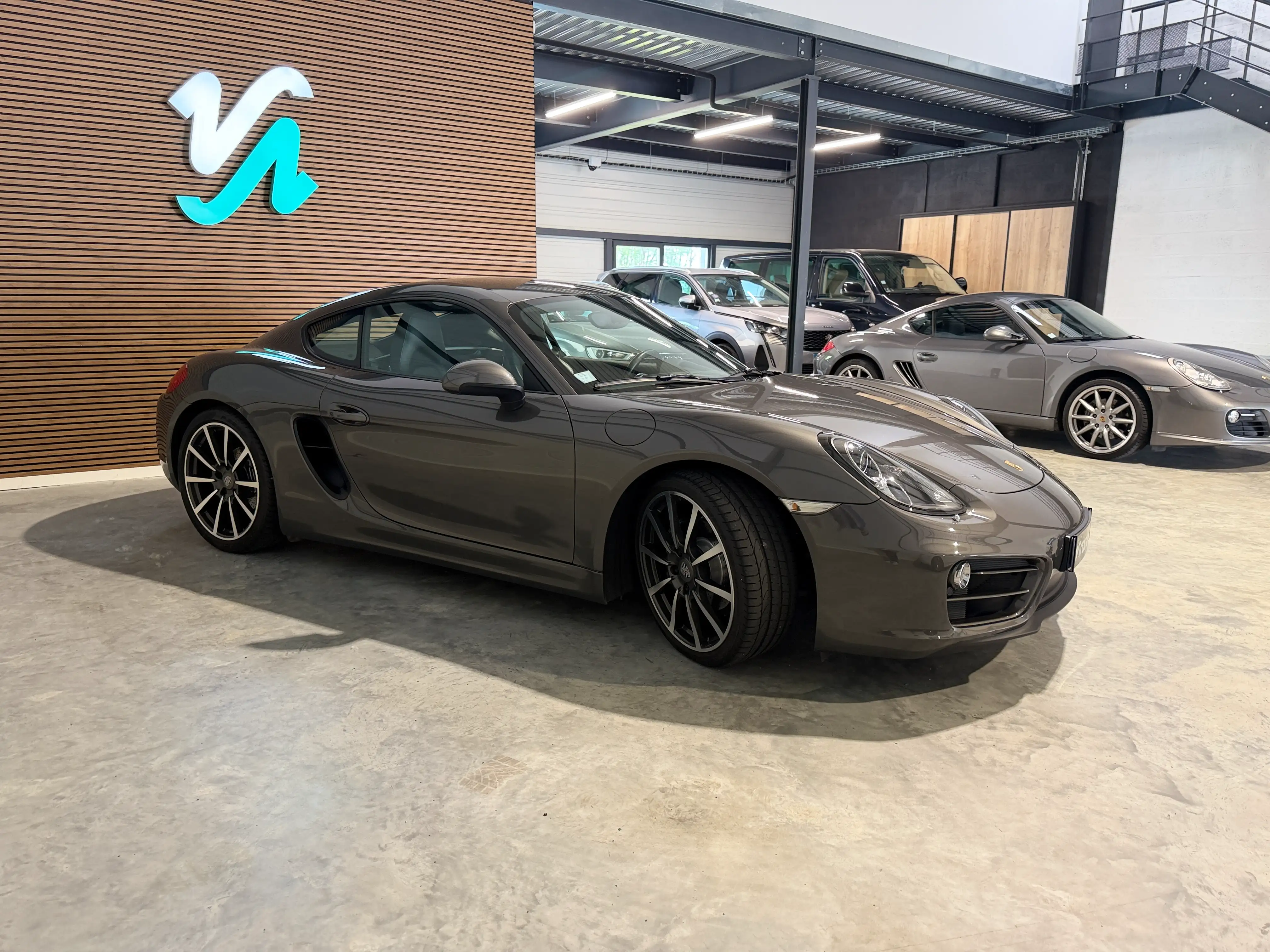 Image secondaire de Porsche Cayman 981 - 275 cv - PDK - 61000 Km - Siege chauffants - Echappement sport - Interieur Cuir - Xenon