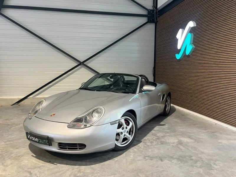 Image principale de PORSCHE BOXSTER - 2.7 - 220 cv - 2000 - 197 000 Km - Sièges chauffants - Xenon